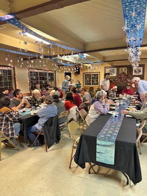 The festively decorated clubhouse was buzzing with conversation as folks enjoyed a ham dinner with a variety of side dishes.