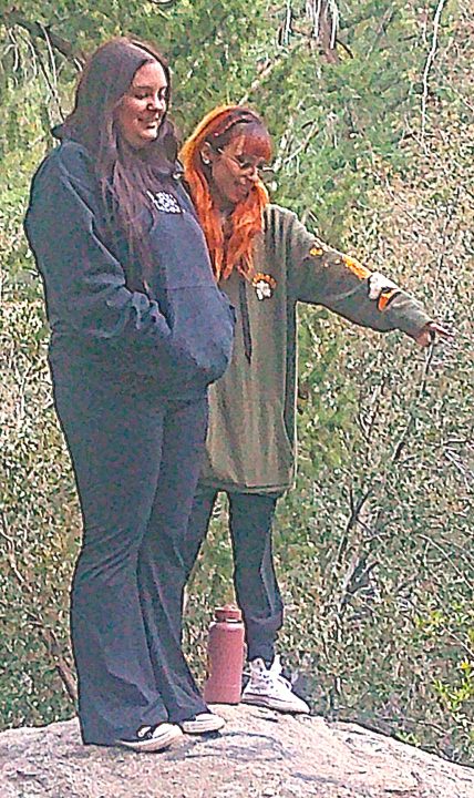 The Heart Rock Trail attracts hikers from across the mountains and around the region. Here friends and first-time visitors Meranda Patterson from Hesperia (left) and Joselin Castillo from Lynwood stand atop the trail’s-end viewpoint.