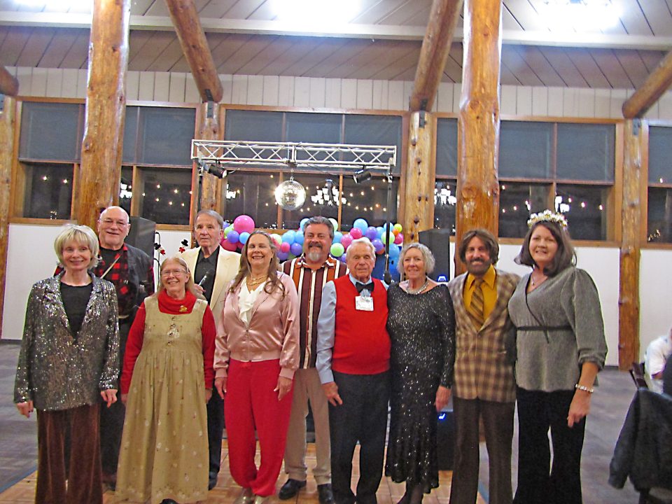Adrianne, Lisa, Julia, Melissa and Adrianna from Glendora and Orange County enjoyed last year’s Brewfest at Tavern Bay Beach Club so much they couldn’t resist attending this year’s event. (Photos by Douglas W. Motley) Group celebrating in festive attire at indoor event.