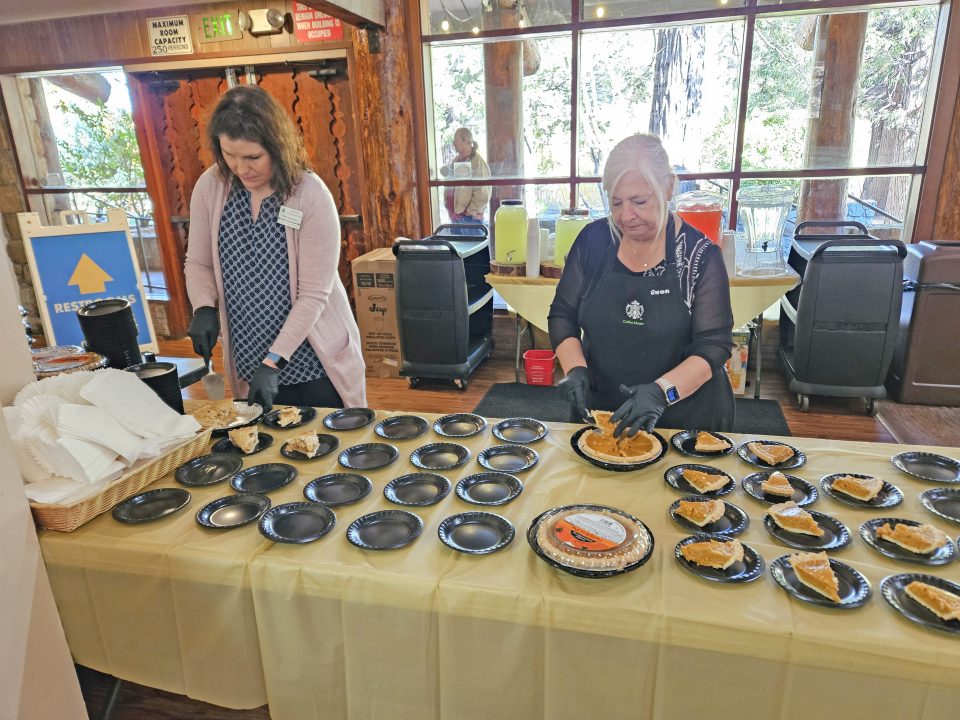Kalyn Shubnell and Gwen Goebbel served slices of pie all afternoon at the San Moritz Lodge. (Photo by Mary-Justine Lanyon)