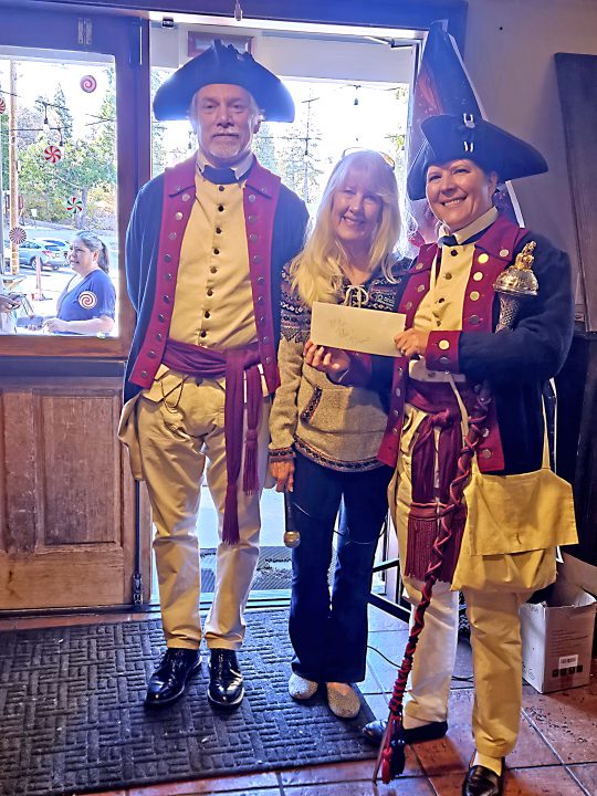 Adrianne, Lisa, Julia, Melissa and Adrianna from Glendora and Orange County enjoyed last year’s Brewfest at Tavern Bay Beach Club so much they couldn’t resist attending this year’s event. (Photos by Douglas W. Motley) People in colonial costumes posing with woman indoors.