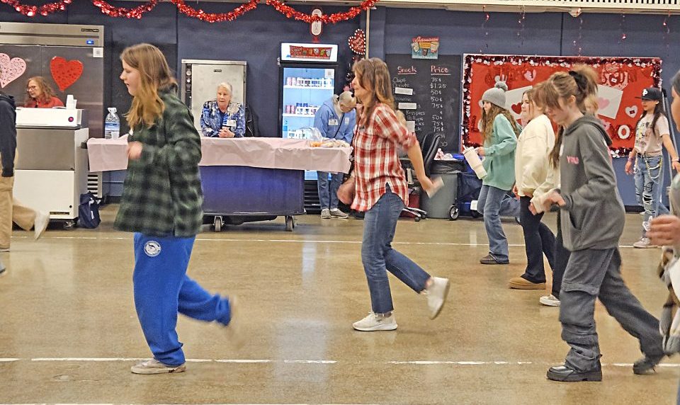 After mastering the line dance steps, the girls put them to music. (Photo by Mary-Justine Lanyon)