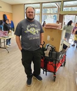 Twin Peaks resident Luke Plubell loaded up a wagon with items for his neighbors who were unable to attend the event.