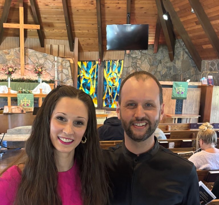 Adrianne, Lisa, Julia, Melissa and Adrianna from Glendora and Orange County enjoyed last year’s Brewfest at Tavern Bay Beach Club so much they couldn’t resist attending this year’s event. (Photos by Douglas W. Motley) Smiling couple inside a wooden church with stained glass.