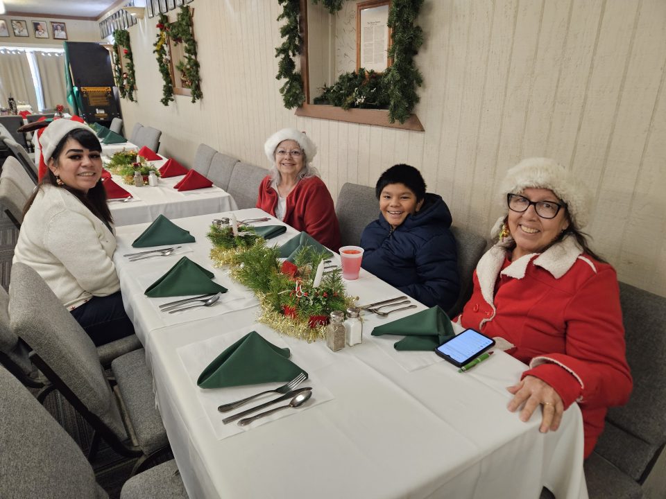 The Barrientos family was the first to arrive at the Operation Provider Christmas dinner. (Photos by Mary-Justine Lanyon)