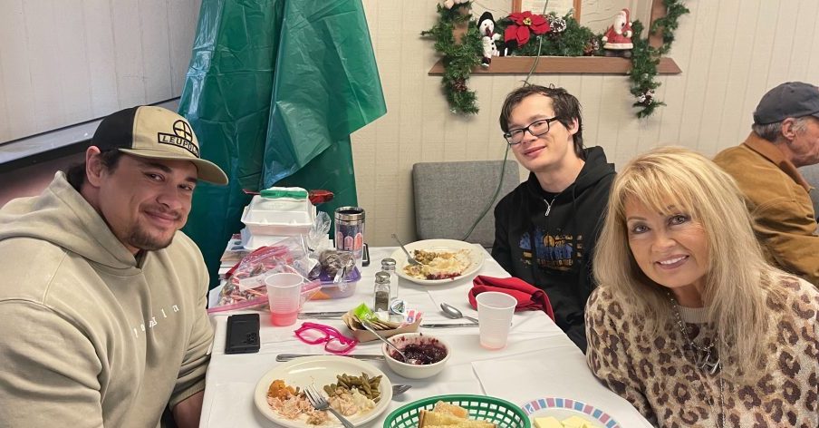 Holland Lowe and her sons, Isaac and Levi, at the Christmas dinner. (Photo courtesy of Holland Lowe)