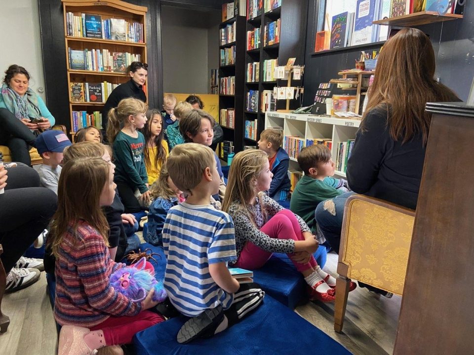 Adrianne, Lisa, Julia, Melissa and Adrianna from Glendora and Orange County enjoyed last year’s Brewfest at Tavern Bay Beach Club so much they couldn’t resist attending this year’s event. (Photos by Douglas W. Motley) Children enjoying storytime at cozy bookstore.