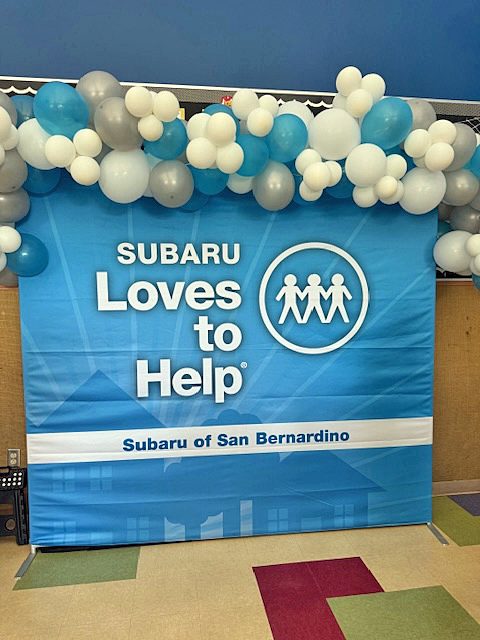 Adrianne, Lisa, Julia, Melissa and Adrianna from Glendora and Orange County enjoyed last year’s Brewfest at Tavern Bay Beach Club so much they couldn’t resist attending this year’s event. (Photos by Douglas W. Motley) Subaru charity event backdrop with balloons.
