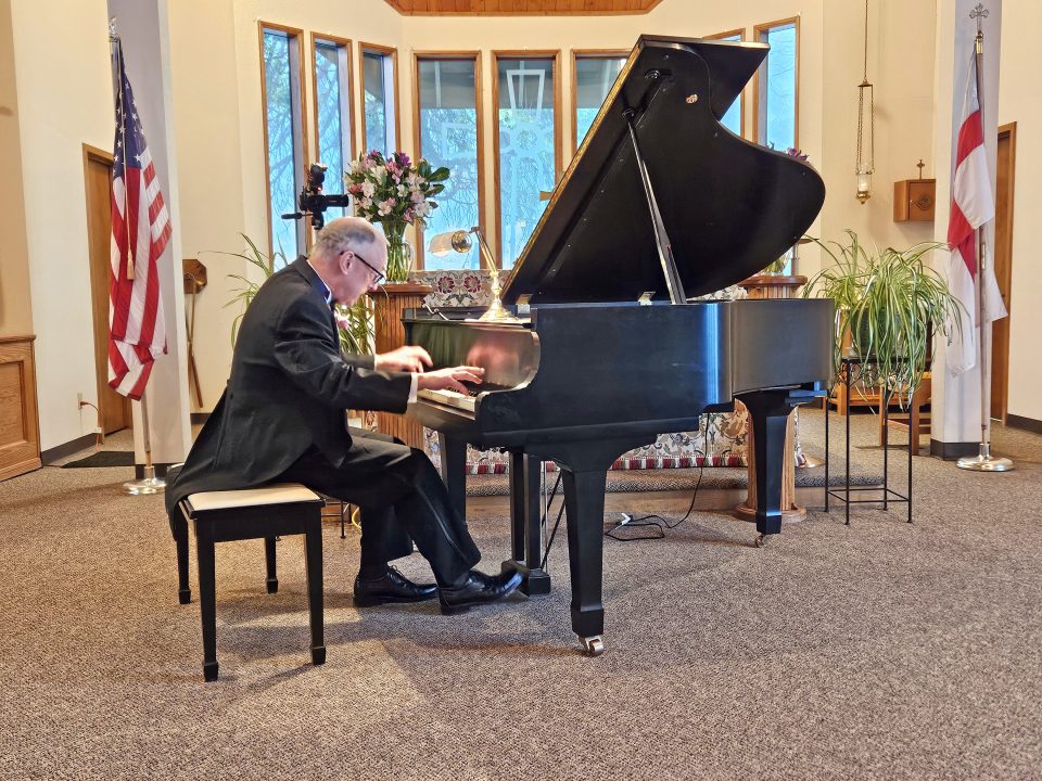 Adrianne, Lisa, Julia, Melissa and Adrianna from Glendora and Orange County enjoyed last year’s Brewfest at Tavern Bay Beach Club so much they couldn’t resist attending this year’s event. (Photos by Douglas W. Motley) Man playing grand piano in church setting.