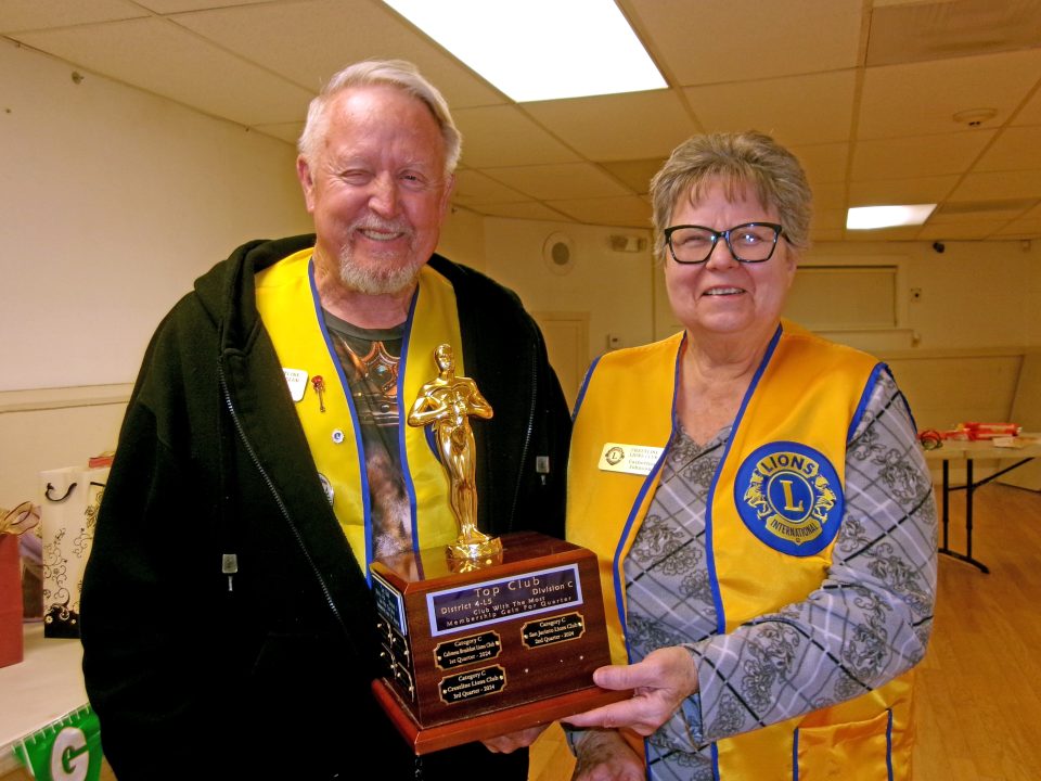 Adrianne, Lisa, Julia, Melissa and Adrianna from Glendora and Orange County enjoyed last year’s Brewfest at Tavern Bay Beach Club so much they couldn’t resist attending this year’s event. (Photos by Douglas W. Motley) Two Lions Club members holding a trophy
