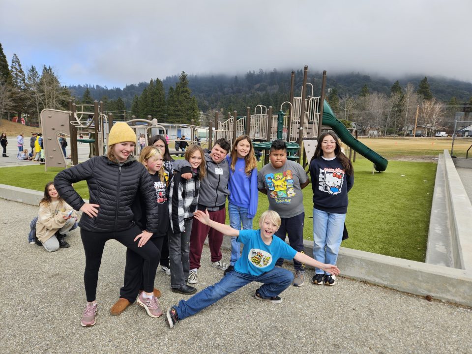 Noah and some of the EarlyAct students out on the VOE playground. (Photo by Mary-Justine Lanyon)