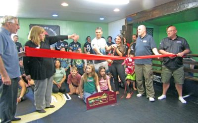 Jiu-jitsu red ribbon cutting draws large crowd