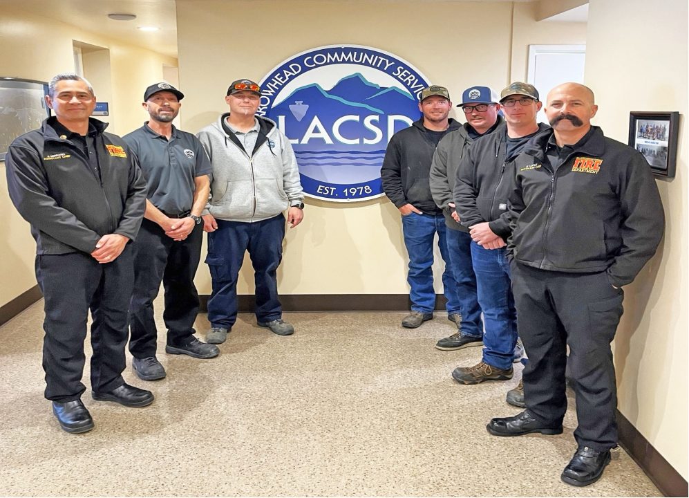 Group of fire department members at LACSD office.