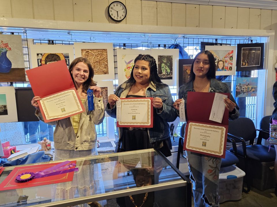 Adrianne, Lisa, Julia, Melissa and Adrianna from Glendora and Orange County enjoyed last year’s Brewfest at Tavern Bay Beach Club so much they couldn’t resist attending this year’s event. (Photos by Douglas W. Motley) Three women holding art competition certificates and awards.