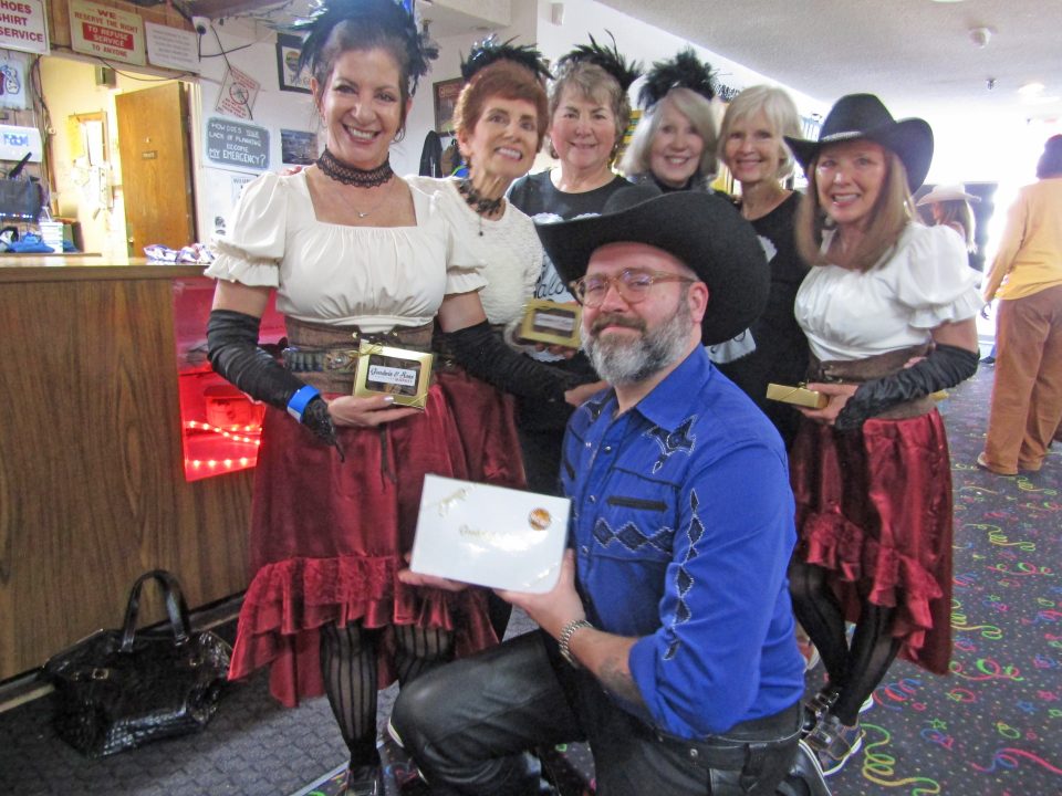 Adrianne, Lisa, Julia, Melissa and Adrianna from Glendora and Orange County enjoyed last year’s Brewfest at Tavern Bay Beach Club so much they couldn’t resist attending this year’s event. (Photos by Douglas W. Motley) Costumed group holding awards at event.