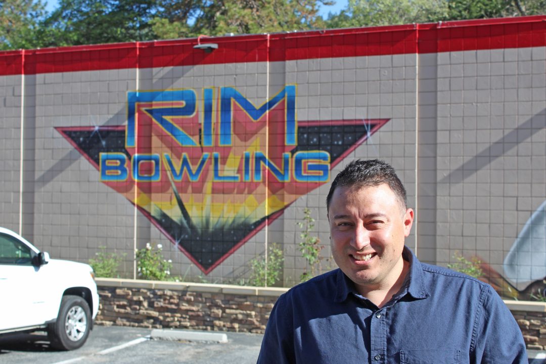 Adrianne, Lisa, Julia, Melissa and Adrianna from Glendora and Orange County enjoyed last year’s Brewfest at Tavern Bay Beach Club so much they couldn’t resist attending this year’s event. (Photos by Douglas W. Motley) Man smiling in front of Rim Bowling sign