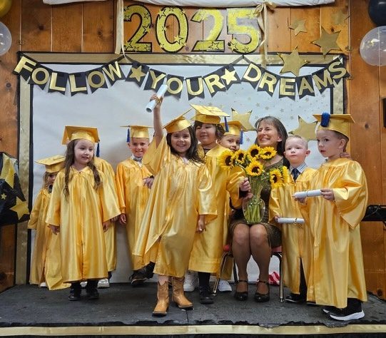 Kindergarten graduation with caps and gowns, 2025.