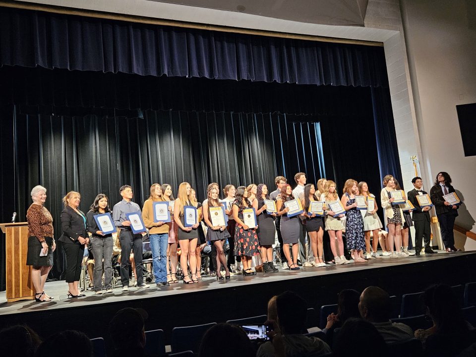 Adrianne, Lisa, Julia, Melissa and Adrianna from Glendora and Orange County enjoyed last year’s Brewfest at Tavern Bay Beach Club so much they couldn’t resist attending this year’s event. (Photos by Douglas W. Motley) Students on stage with awards at ceremony.