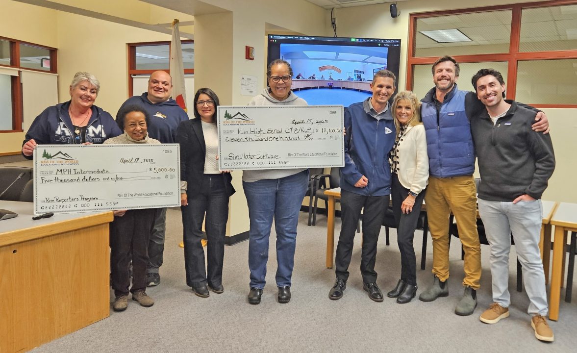 Adrianne, Lisa, Julia, Melissa and Adrianna from Glendora and Orange County enjoyed last year’s Brewfest at Tavern Bay Beach Club so much they couldn’t resist attending this year’s event. (Photos by Douglas W. Motley) Group with large donation checks at meeting room.