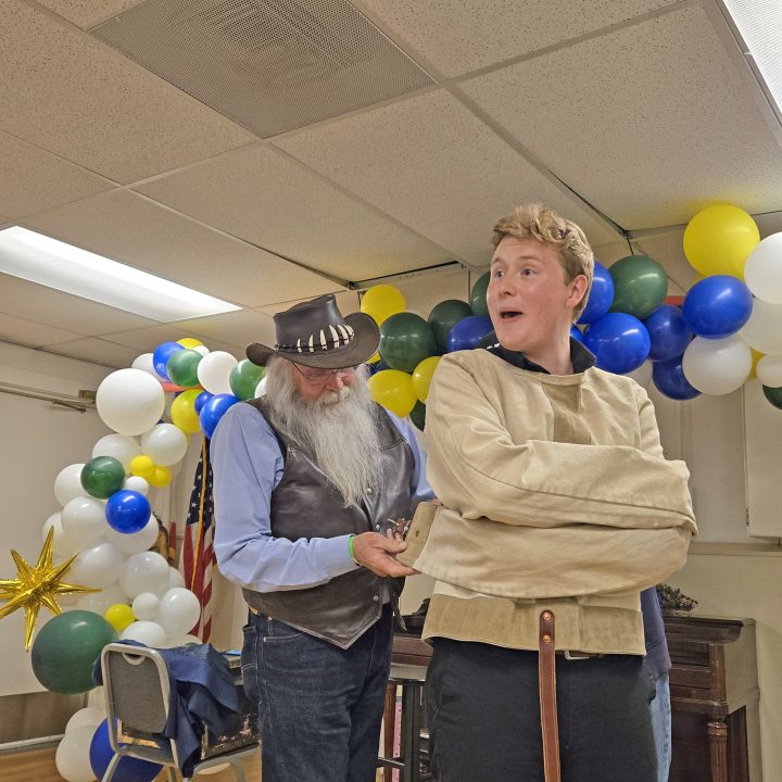 Adrianne, Lisa, Julia, Melissa and Adrianna from Glendora and Orange County enjoyed last year’s Brewfest at Tavern Bay Beach Club so much they couldn’t resist attending this year’s event. (Photos by Douglas W. Motley) Magician performs escape trick in a decorated room.