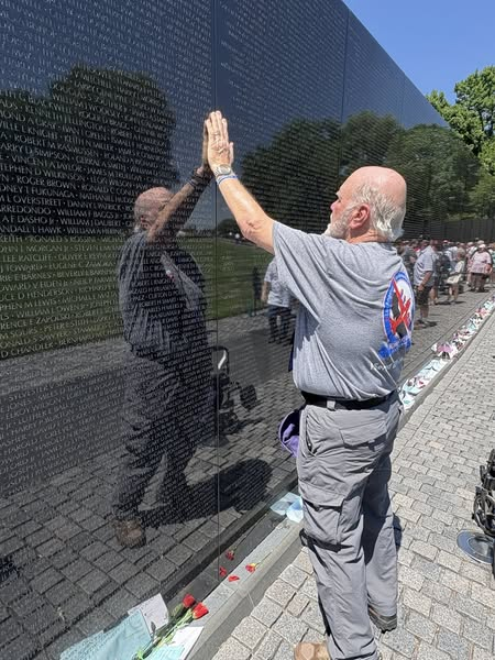 Adrianne, Lisa, Julia, Melissa and Adrianna from Glendora and Orange County enjoyed last year’s Brewfest at Tavern Bay Beach Club so much they couldn’t resist attending this year’s event. (Photos by Douglas W. Motley) Vietnam Veteran touching Vietnam Veterans Memorial wall names.