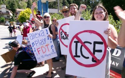 Hundreds protest mass deportations