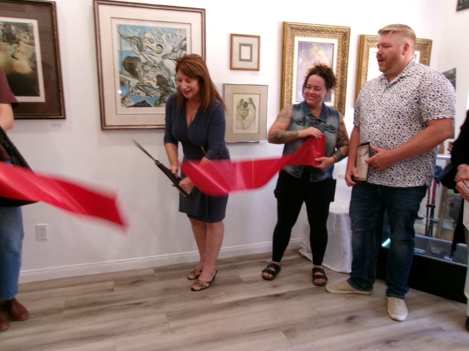 Adrianne, Lisa, Julia, Melissa and Adrianna from Glendora and Orange County enjoyed last year’s Brewfest at Tavern Bay Beach Club so much they couldn’t resist attending this year’s event. (Photos by Douglas W. Motley) People at art gallery ribbon-cutting ceremony