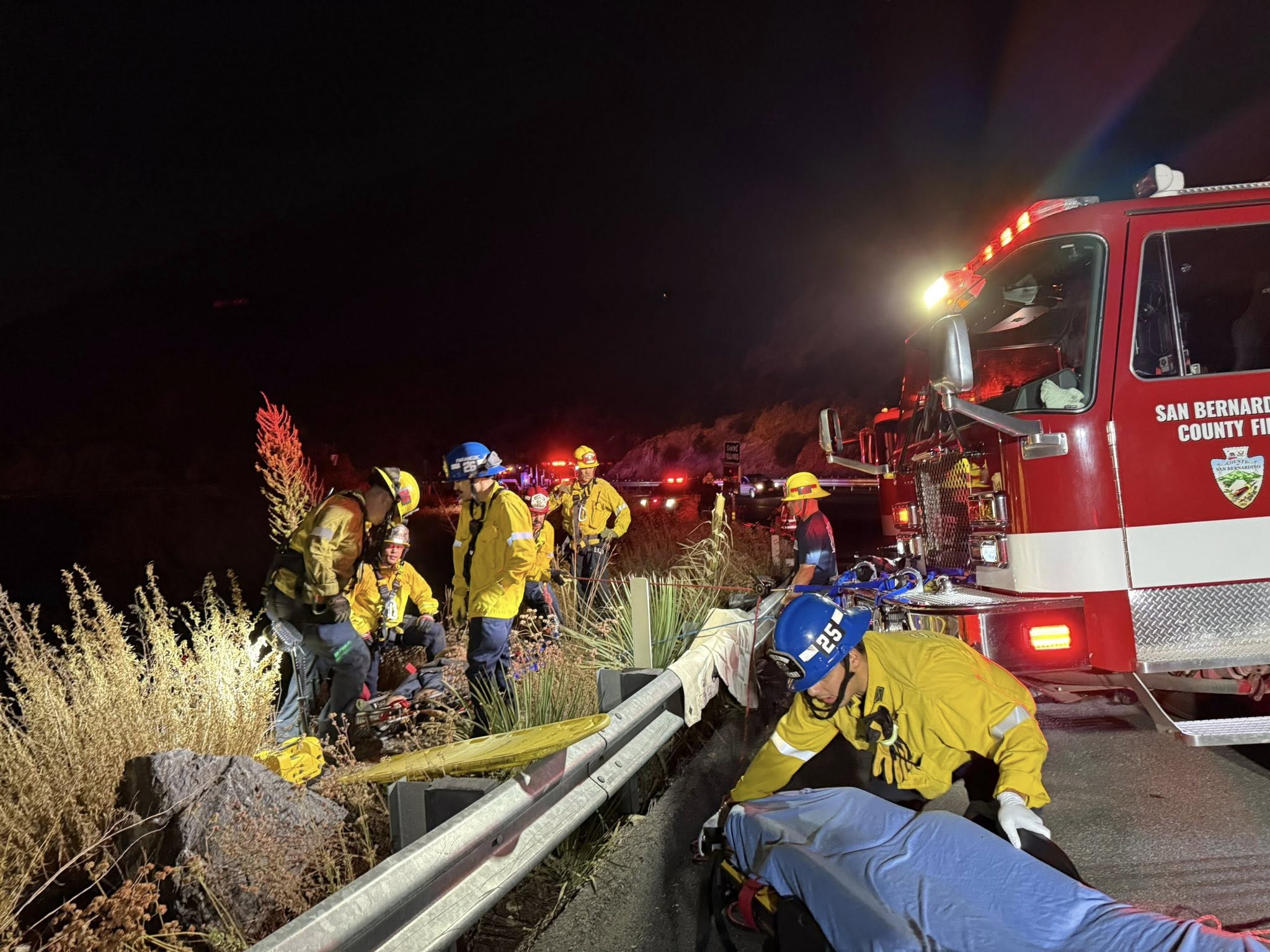 Firefighters rescue operation at night scene