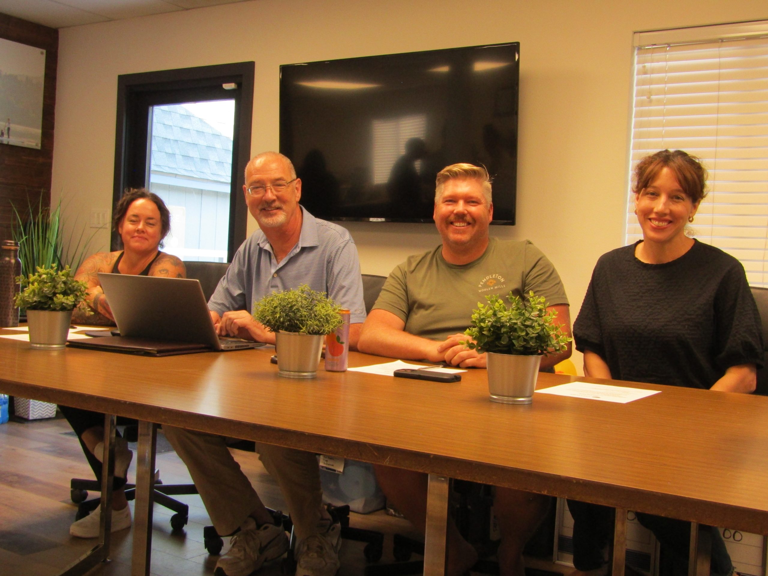 Adrianne, Lisa, Julia, Melissa and Adrianna from Glendora and Orange County enjoyed last year’s Brewfest at Tavern Bay Beach Club so much they couldn’t resist attending this year’s event. (Photos by Douglas W. Motley) Team meeting with four people at conference table.
