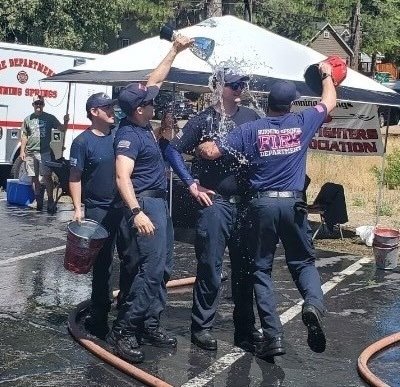 Adrianne, Lisa, Julia, Melissa and Adrianna from Glendora and Orange County enjoyed last year’s Brewfest at Tavern Bay Beach Club so much they couldn’t resist attending this year’s event. (Photos by Douglas W. Motley) Firefighters playfully splashing each other with water.
