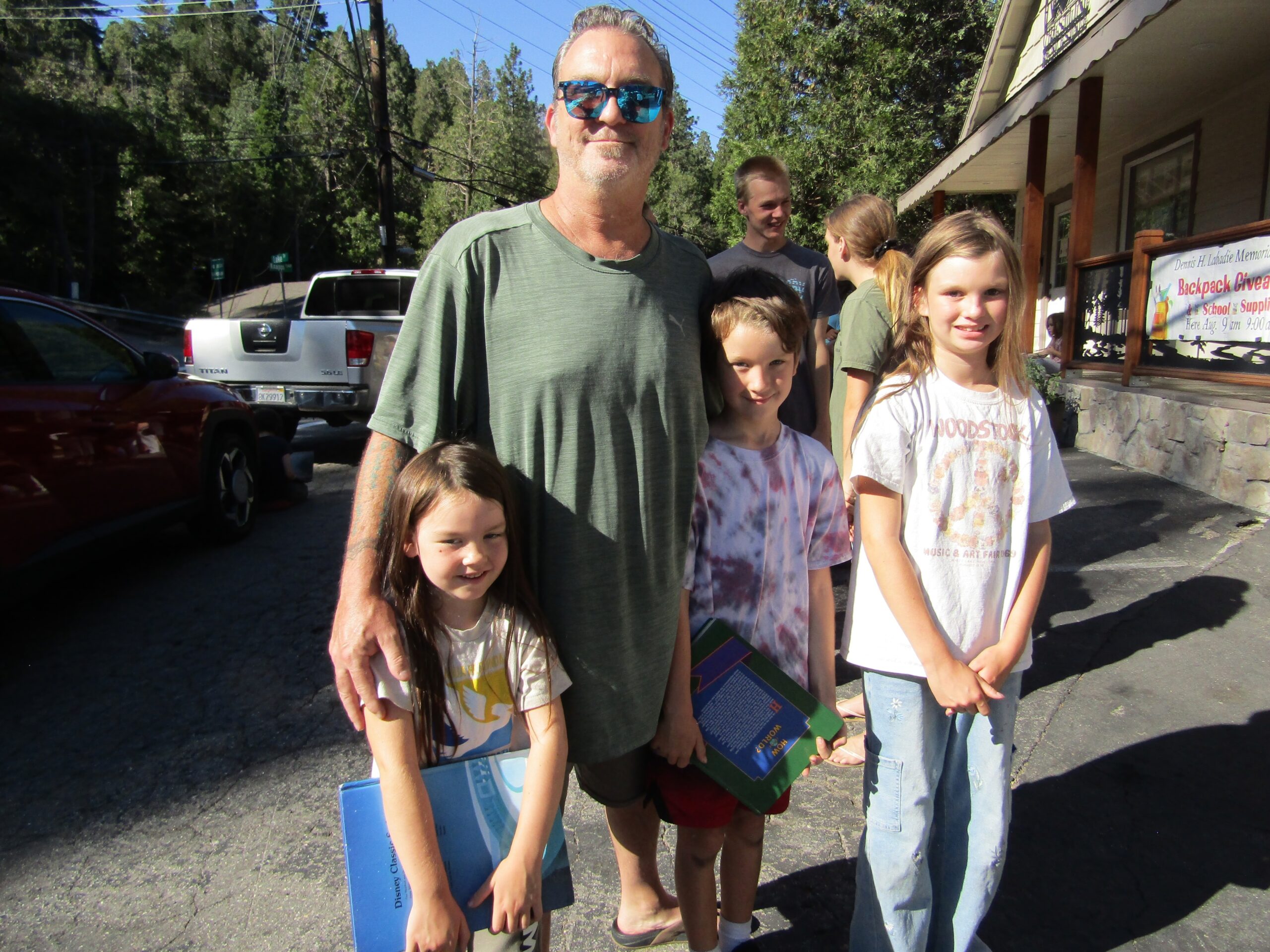 Adrianne, Lisa, Julia, Melissa and Adrianna from Glendora and Orange County enjoyed last year’s Brewfest at Tavern Bay Beach Club so much they couldn’t resist attending this year’s event. (Photos by Douglas W. Motley) Family outdoors, holding school supplies