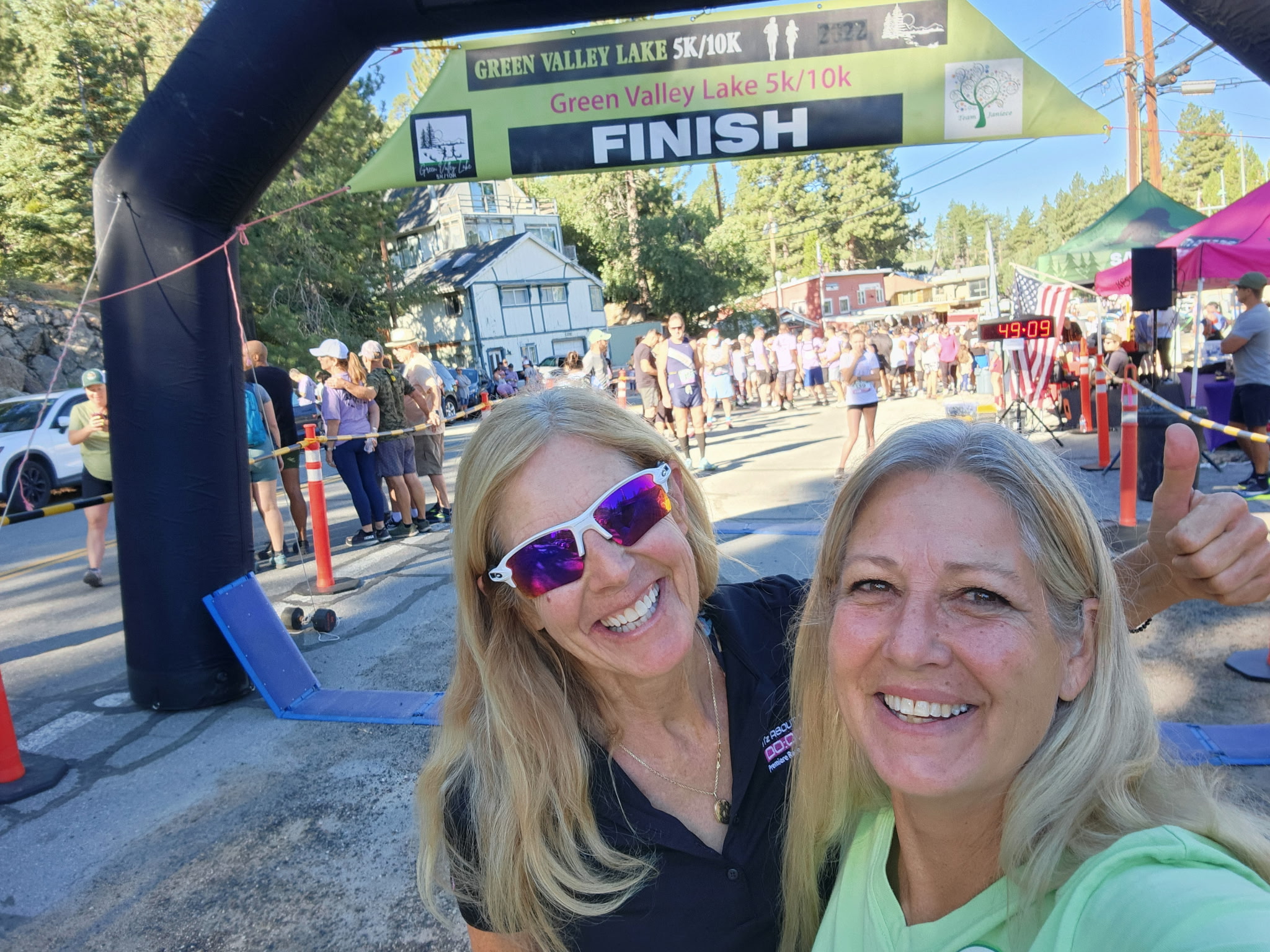 Adrianne, Lisa, Julia, Melissa and Adrianna from Glendora and Orange County enjoyed last year’s Brewfest at Tavern Bay Beach Club so much they couldn’t resist attending this year’s event. (Photos by Douglas W. Motley) Two women smiling at race finish line.