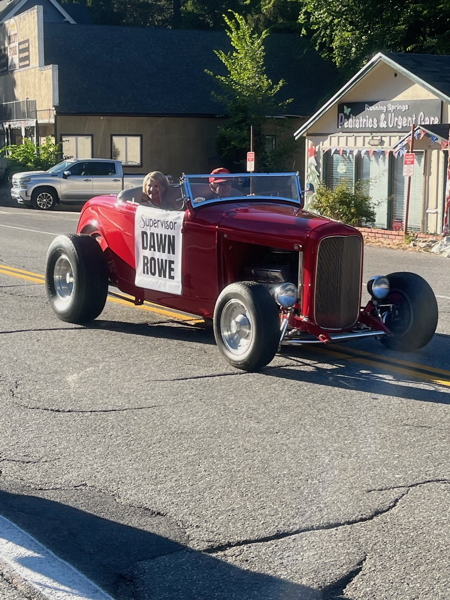 Adrianne, Lisa, Julia, Melissa and Adrianna from Glendora and Orange County enjoyed last year’s Brewfest at Tavern Bay Beach Club so much they couldn’t resist attending this year’s event. (Photos by Douglas W. Motley) Red vintage car in street parade.