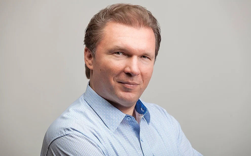 Smiling man in blue shirt portrait