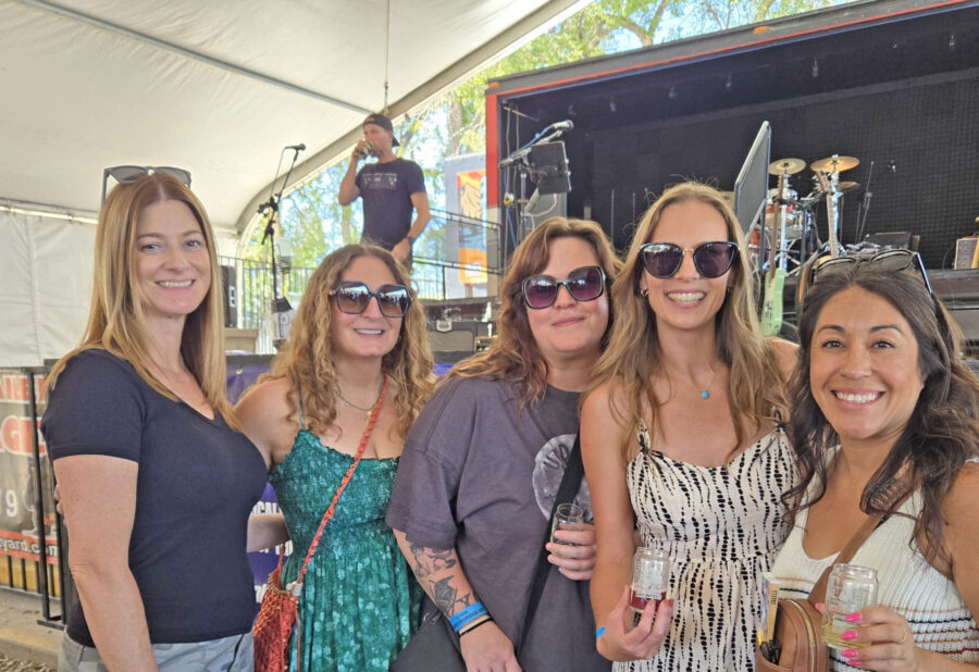 Adrianne, Lisa, Julia, Melissa and Adrianna from Glendora and Orange County enjoyed last year’s Brewfest at Tavern Bay Beach Club so much they couldn’t resist attending this year’s event. (Photos by Douglas W. Motley) Group of women smiling at outdoor music event.