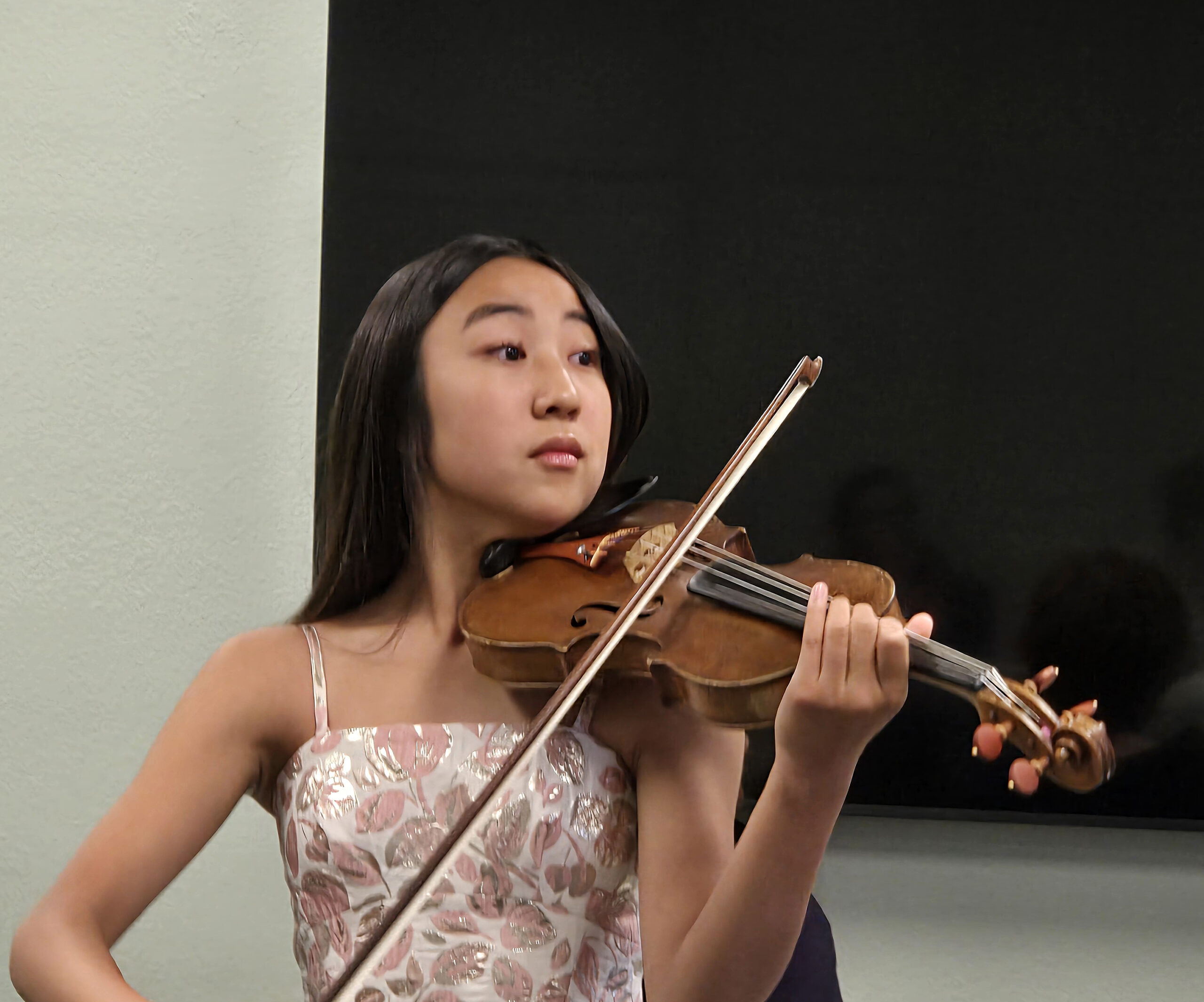 Adrianne, Lisa, Julia, Melissa and Adrianna from Glendora and Orange County enjoyed last year’s Brewfest at Tavern Bay Beach Club so much they couldn’t resist attending this year’s event. (Photos by Douglas W. Motley) Young girl playing violin in elegant dress.