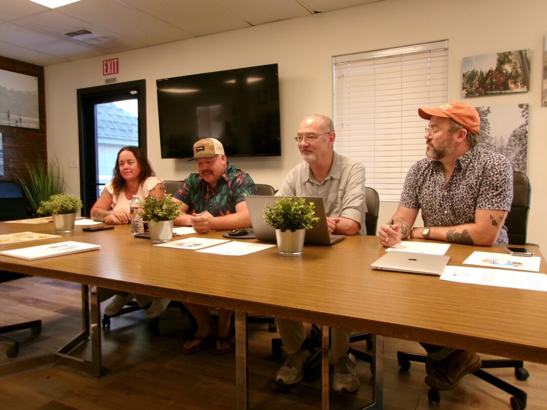 Adrianne, Lisa, Julia, Melissa and Adrianna from Glendora and Orange County enjoyed last year’s Brewfest at Tavern Bay Beach Club so much they couldn’t resist attending this year’s event. (Photos by Douglas W. Motley) Team meeting at conference table with four people.