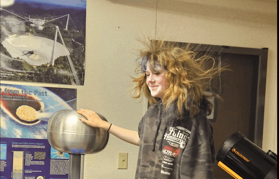 Adrianne, Lisa, Julia, Melissa and Adrianna from Glendora and Orange County enjoyed last year’s Brewfest at Tavern Bay Beach Club so much they couldn’t resist attending this year’s event. (Photos by Douglas W. Motley) Person touching Van de Graaff generator.