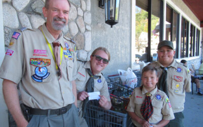 Scouts collect nearly a ton of food for those in need