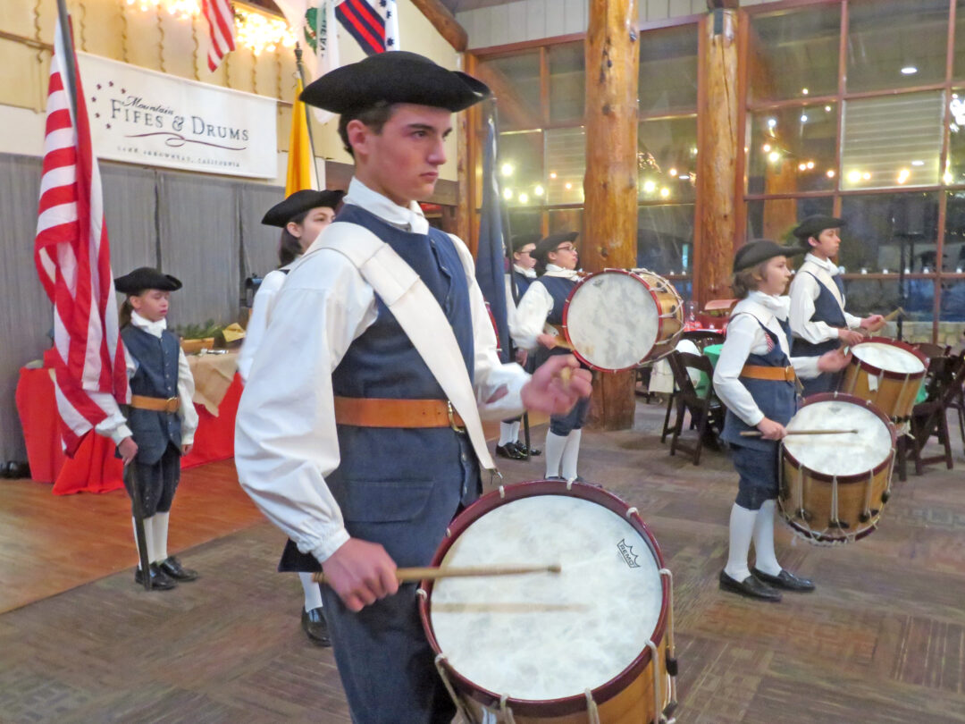 Adrianne, Lisa, Julia, Melissa and Adrianna from Glendora and Orange County enjoyed last year’s Brewfest at Tavern Bay Beach Club so much they couldn’t resist attending this year’s event. (Photos by Douglas W. Motley) Colonial drummers perform in traditional attire indoors.