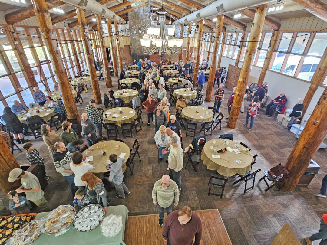 Adrianne, Lisa, Julia, Melissa and Adrianna from Glendora and Orange County enjoyed last year’s Brewfest at Tavern Bay Beach Club so much they couldn’t resist attending this year’s event. (Photos by Douglas W. Motley) People gathering in a large rustic event hall.