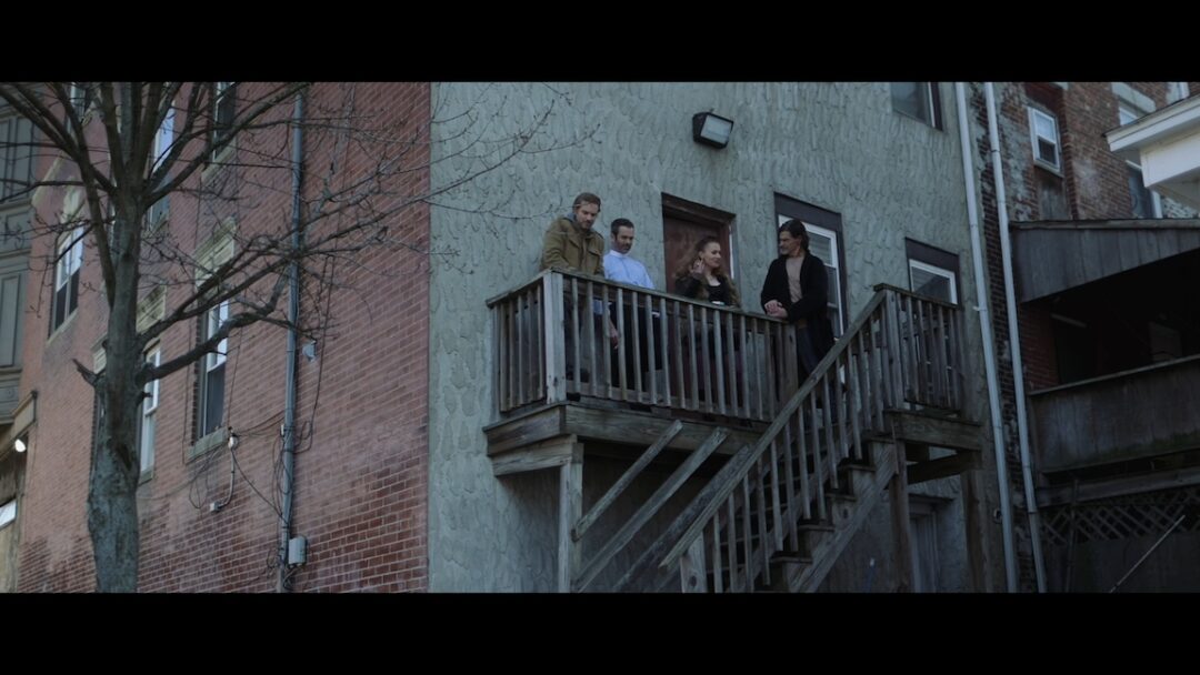 The four siblings – Ronan (Jeff Berg), Father Mickey (Chad Doreck), Fiona (Aly Trasher) and Kier (Don Swayze) – on the porch of their home in Chelsea, Mass. (Contributed photos)
