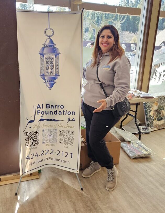 Community Giveback 1-Najoi JabaliNajoi Jabali, founder of the Al Barro Foundation, greeted all the folks who came to last year’s Community Giveback.