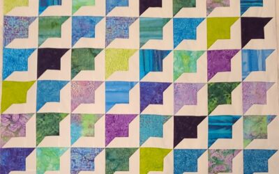 Kids wrapped in quilts of love