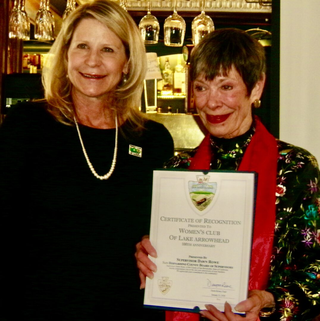 Adrianne, Lisa, Julia, Melissa and Adrianna from Glendora and Orange County enjoyed last year’s Brewfest at Tavern Bay Beach Club so much they couldn’t resist attending this year’s event. (Photos by Douglas W. Motley) Dawn Rowe presents a Certificate of Recognition to Club President Polly Sauer. (Photos by Rhea-Frances Tetley)