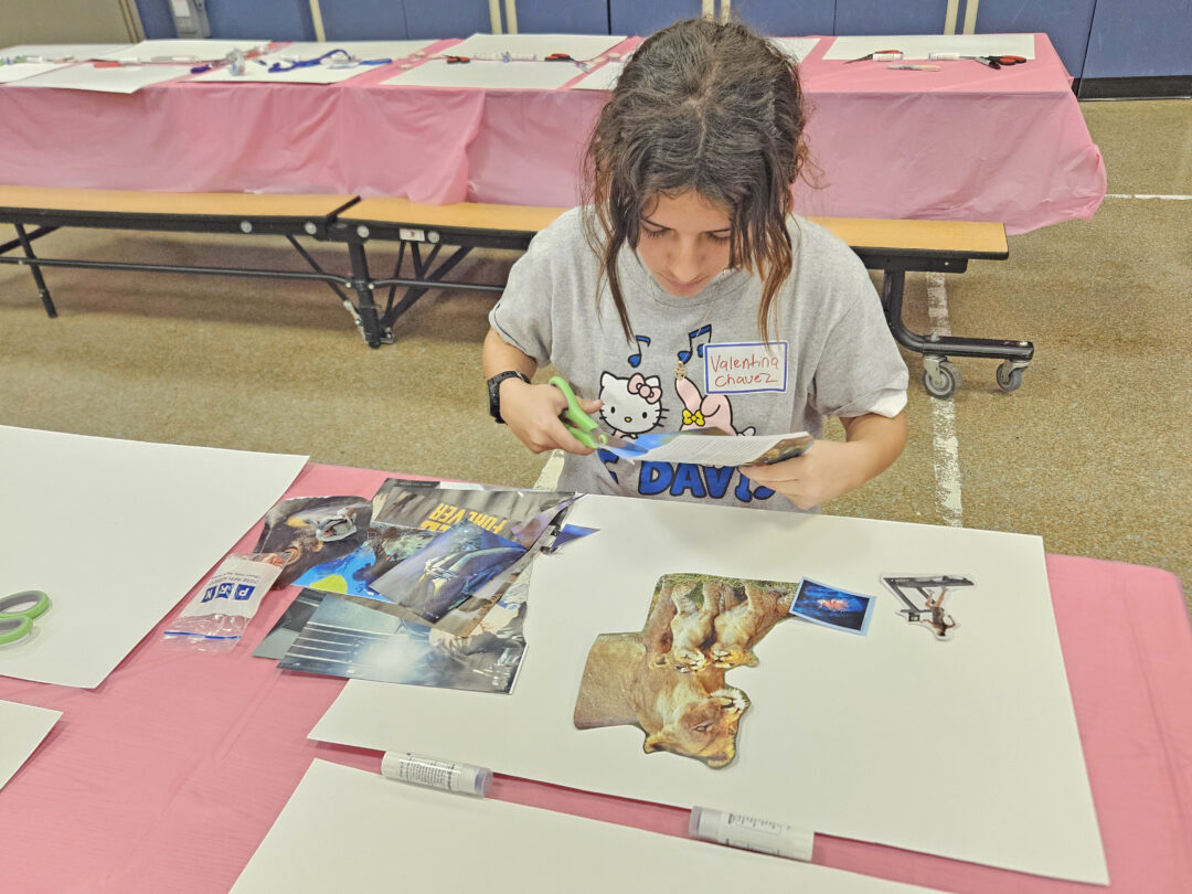 Valentina Chavez works on her vision board.