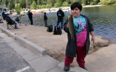 Fishermen line the shores of Lake Gregory on Derby Day