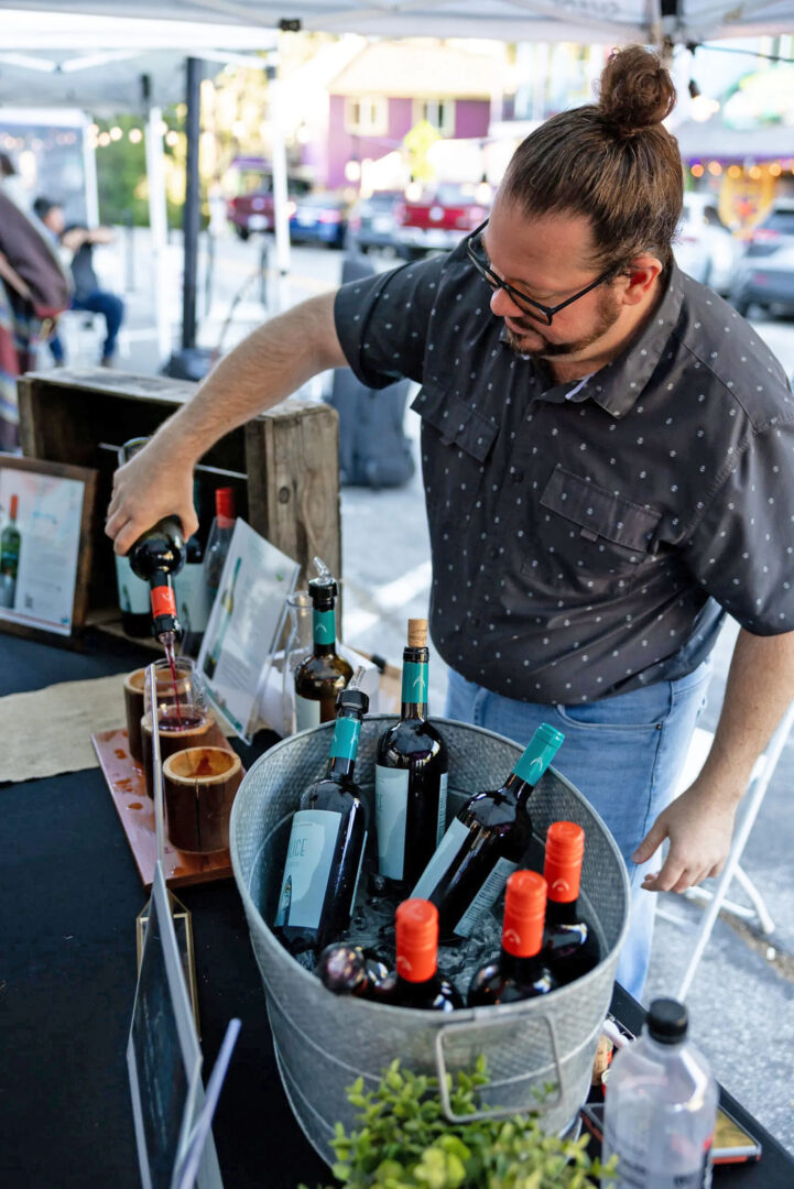 Adrianne, Lisa, Julia, Melissa and Adrianna from Glendora and Orange County enjoyed last year’s Brewfest at Tavern Bay Beach Club so much they couldn’t resist attending this year’s event. (Photos by Douglas W. Motley) A vendor pouring a taste at a previous Corks & Hops. (File photo)