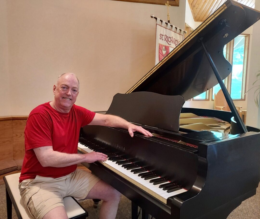 John Reith at his piano. (Photo by Julianne Homokay)