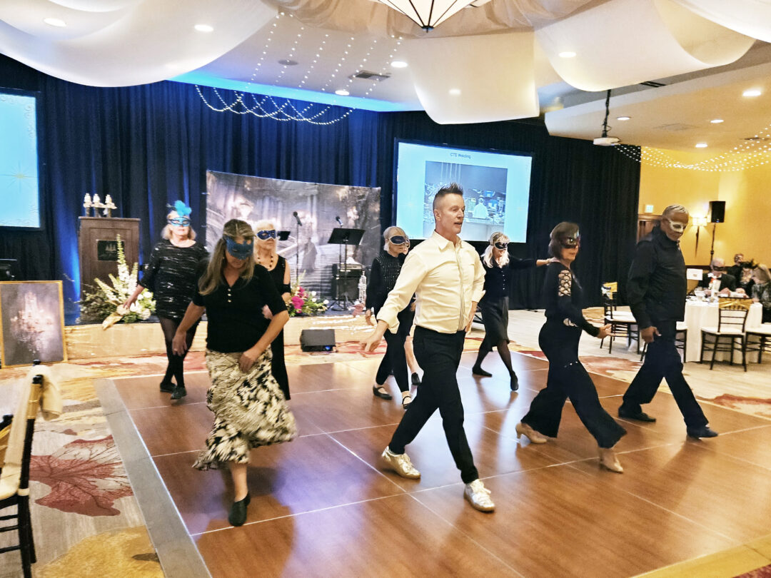 Steve Valentine and his Ballroom Burn dancers in their “Masquerade Mashup.” (Photos by Mary-Justine Lanyon)